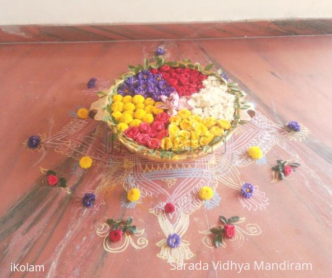 Rangoli: Urli flower decoration Rangoli: Urli flower decoration