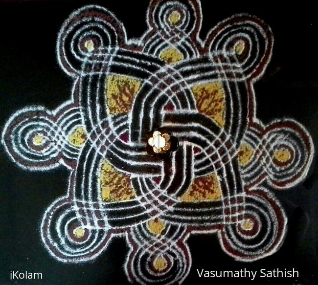 Rangoli: Friday Pooja kolam with rice flour coloured with haldi and kumkum Rangoli: Friday Pooja kolam with rice flour coloured with haldi and kumkum