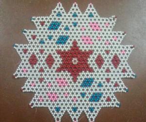 AISHWARYA KOLAM WITH BEADS