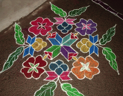 Rangoli: Candles and flowers