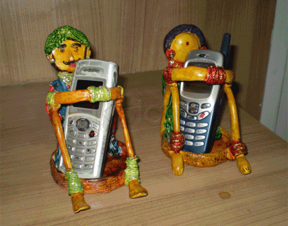Rangoli: Mobile phone holders