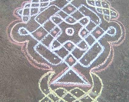 Dotted Rangoli with added art.