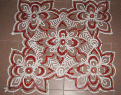 Rangoli: Red/white flowers