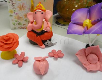 Rangoli: Color clay dough Ganesha