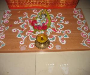 Rangoli: AAlLILAI KRISHNA onThe Kolam
