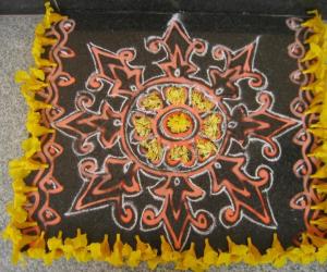 Rangoli: Red/yellow Kadhamba kolam