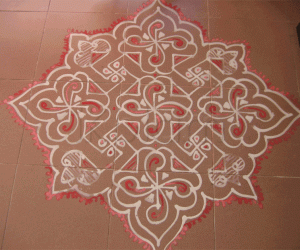 Rangoli: Pink and white kolam