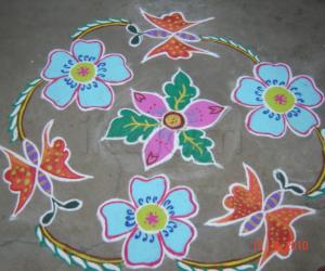 Rangoli: Butterfiy,flower kolam.