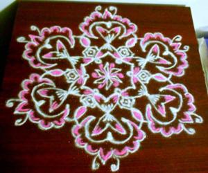 Pinky white kolam