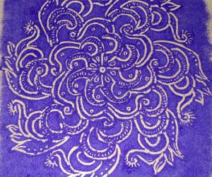 white kolam on violet base.