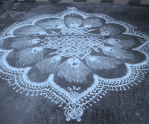 Rangoli: Krishna's feather rangoli