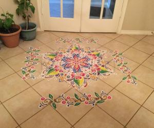 Freehand rangoli with riceflour.