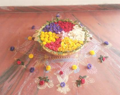 Rangoli: Urli flower decoration 