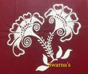 Flower rangoli in white 