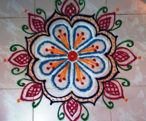 Freehand flower rangoli