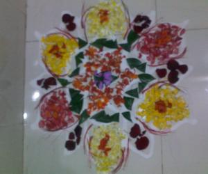 poo kolam drawn at the puja room