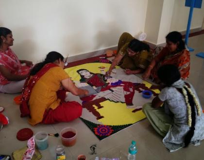 preparation of rangoli multi tasking lady