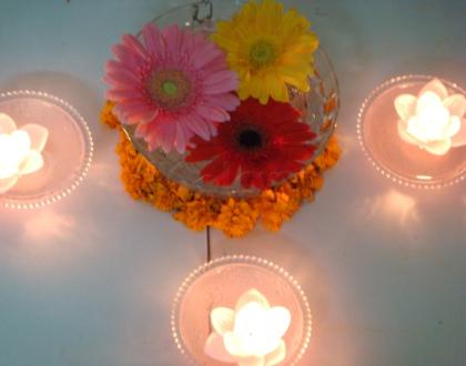 Rangoli: Flowers and Diyas in water - Diwali