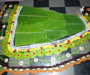 Rangoli: Rangoli around banana leaf