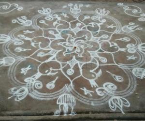 Floral rangoli  with peacocks 