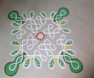 Rangoli: BOTTLE GUARD CREEPER IN CHIKKU RANGOLI