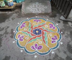 Very simple yellow rangoli.