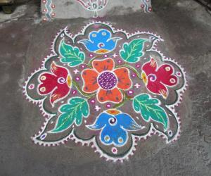 Rangoli: Flower & leaf colour kolam.