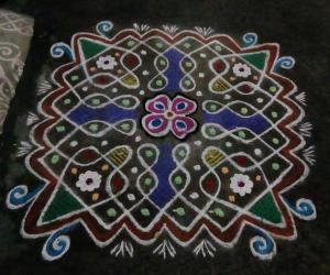 Rangoli: Rev's chikku kolam 47. Mayday wishes.