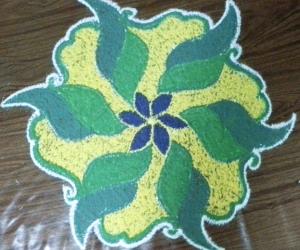Rangoli: A dotted rangoli with 9-5 interlaced dots