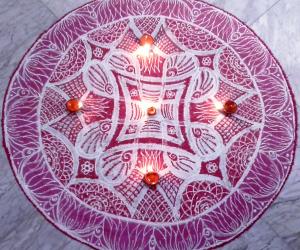 Double stroke padi kolam for Panguni Uthiram with kolamavu and red colour.