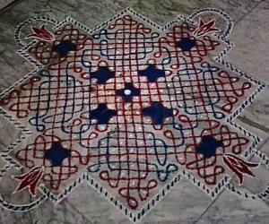 Rangoli: Chikku kolam for Thai Poosam  with 15-15 straight dots with 5 dots 3 lines  in the centre on all sides