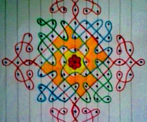 Rangoli: Chikku kolam with 13-1 straight dots.