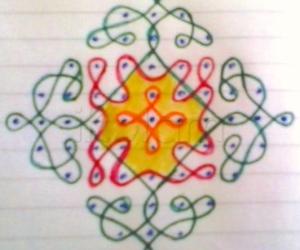Rangoli: Chikku kolam with 11-1 straight dots.