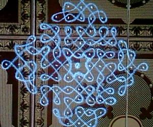 Chikku kolam with 13-1 straight dots.
