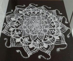 freehand rangoli with rice flour