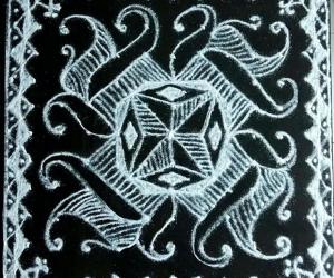 Margazhi Day 12 Kolam - A dotted rangoli with 9-9 straight dots. 