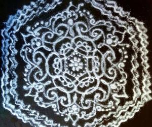 Freehand rangoli with kolamavu 