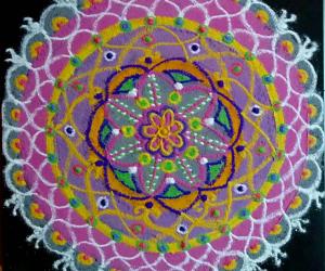 A Freehand Pooja kolam with recycled colours 