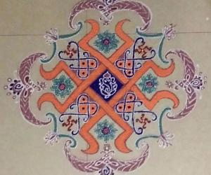 Dotted Ganesha Rangoli with colours 13×5 till 5 straight dots