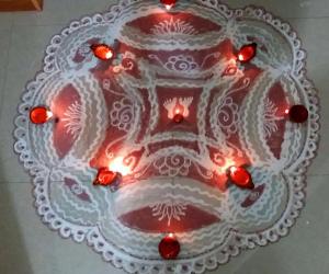 Rangoli: Krishnajayanthi Padi Kolam with rice batter