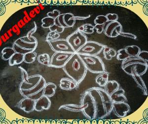 Rangoli: Deepam kolam with kavi