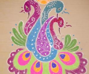 peacock rangoli with diya