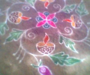 rangoli with lamp & leaves