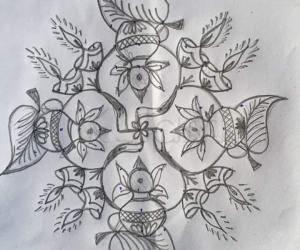 One more simple kalash rangoli.....