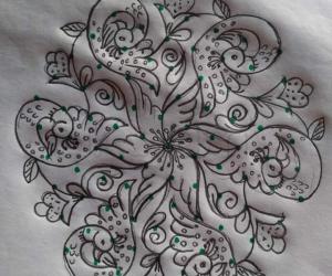 11 to 6 interlaced dotted peacock rangoli....