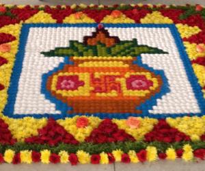 Devotional kolam mix of kumil, and flowers