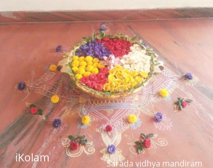 Rangoli: Urli flower decoration 