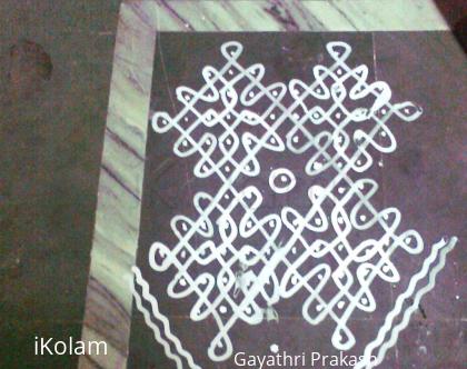 Rangoli: Navami kolam for Navarathri with wet maavu