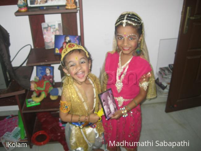 Krishna & Radha - This is gokulastami celebration.Viswesh ,Nithila are with their dad s photo (his krishna costume)