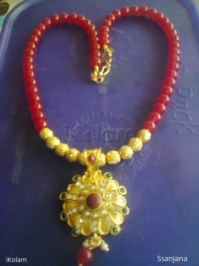 Jewelry - necklaces - i made itby red beeds with the gold balls